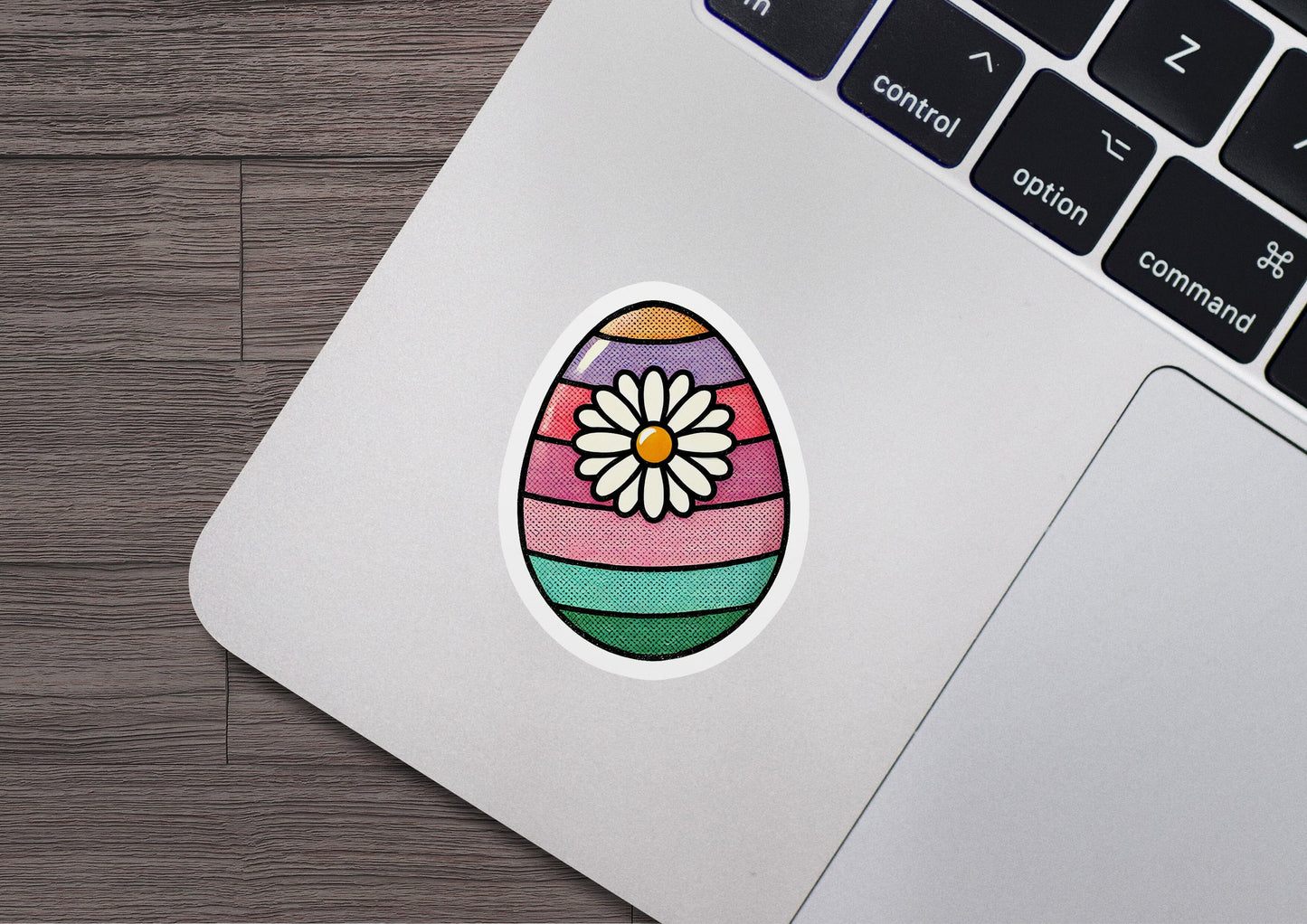 a sticker of an easter egg with a flower on it