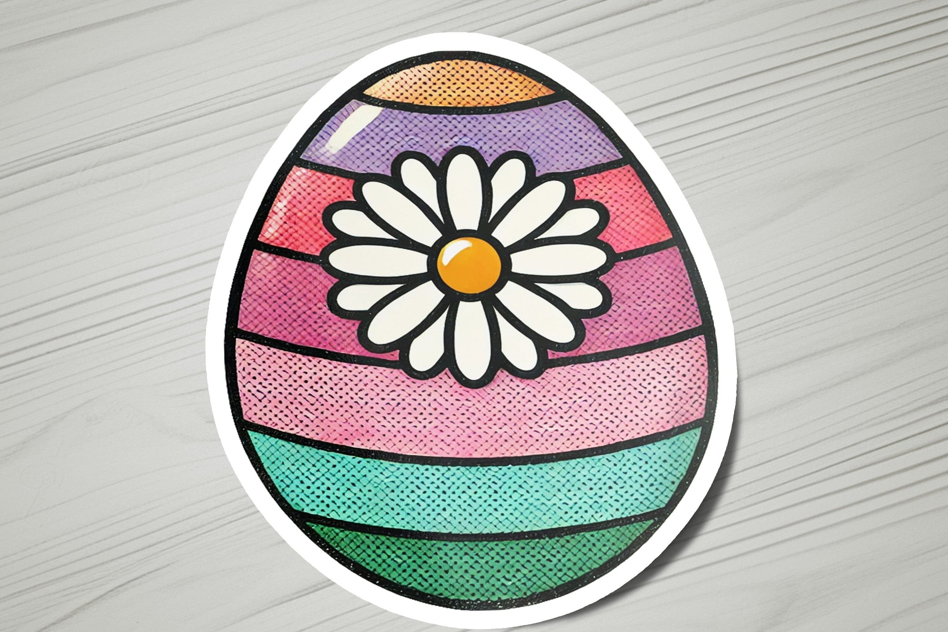 an easter egg with a flower painted on it
