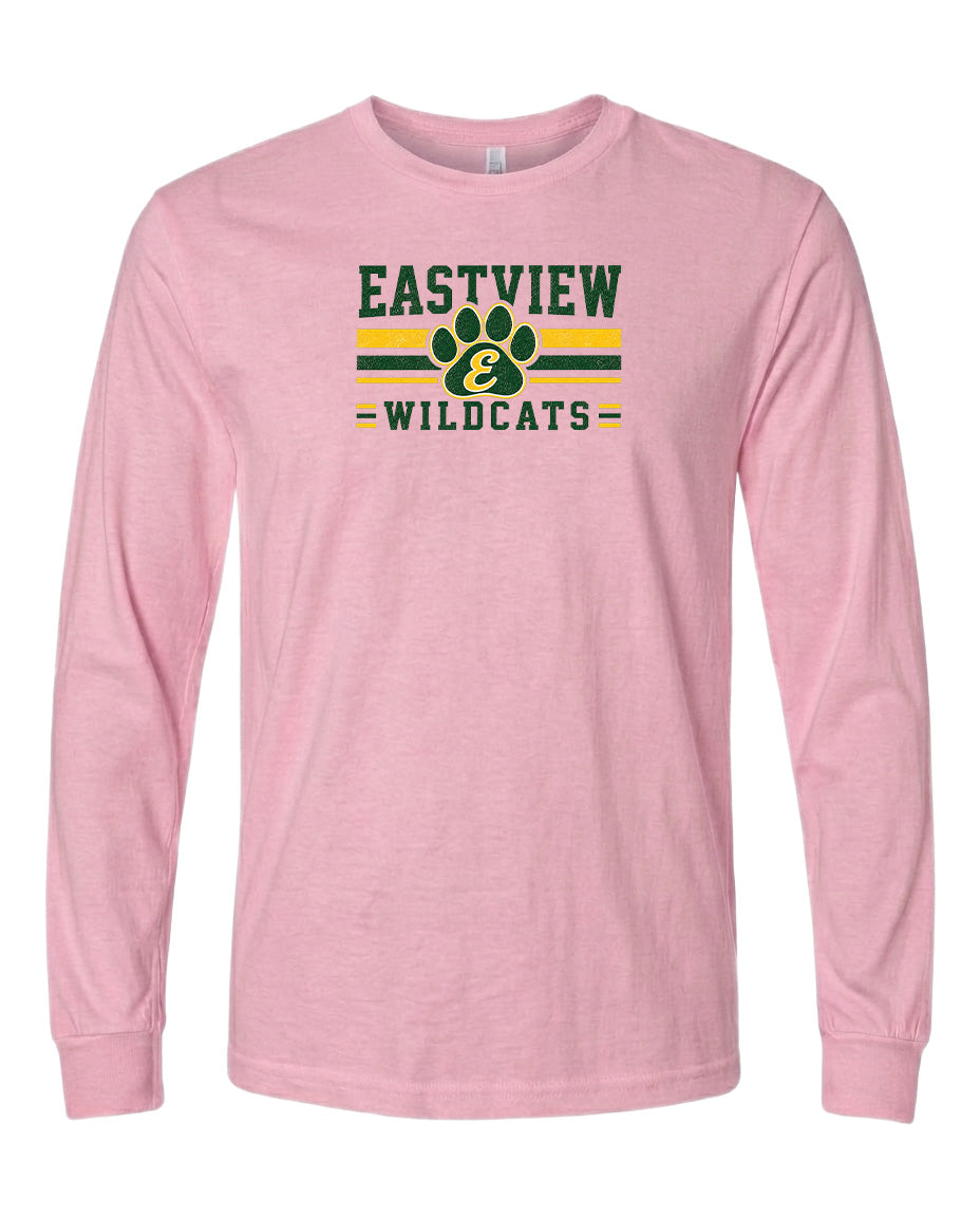 A pink long-sleeved t-shirt with a graphic design featuring the text "EASTVIEW WILDCATS" and a paw print symbol.