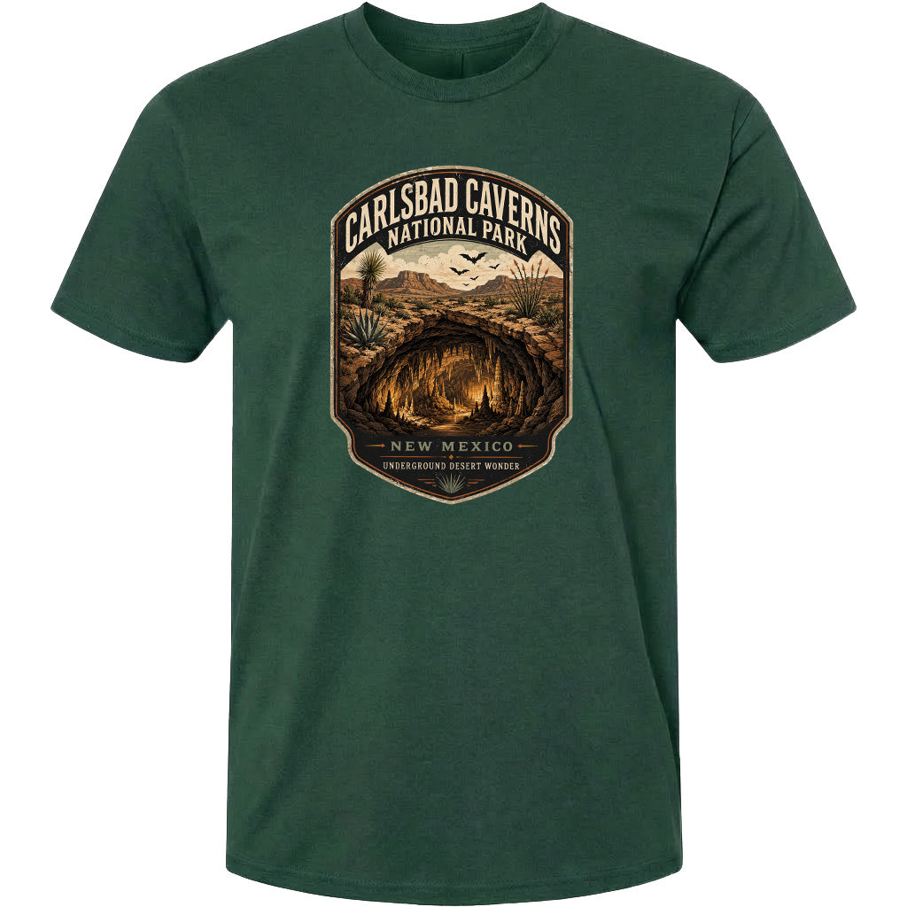 A green t-shirt with a graphic design depicting the Carlsbad Caves National Park in New Mexico.