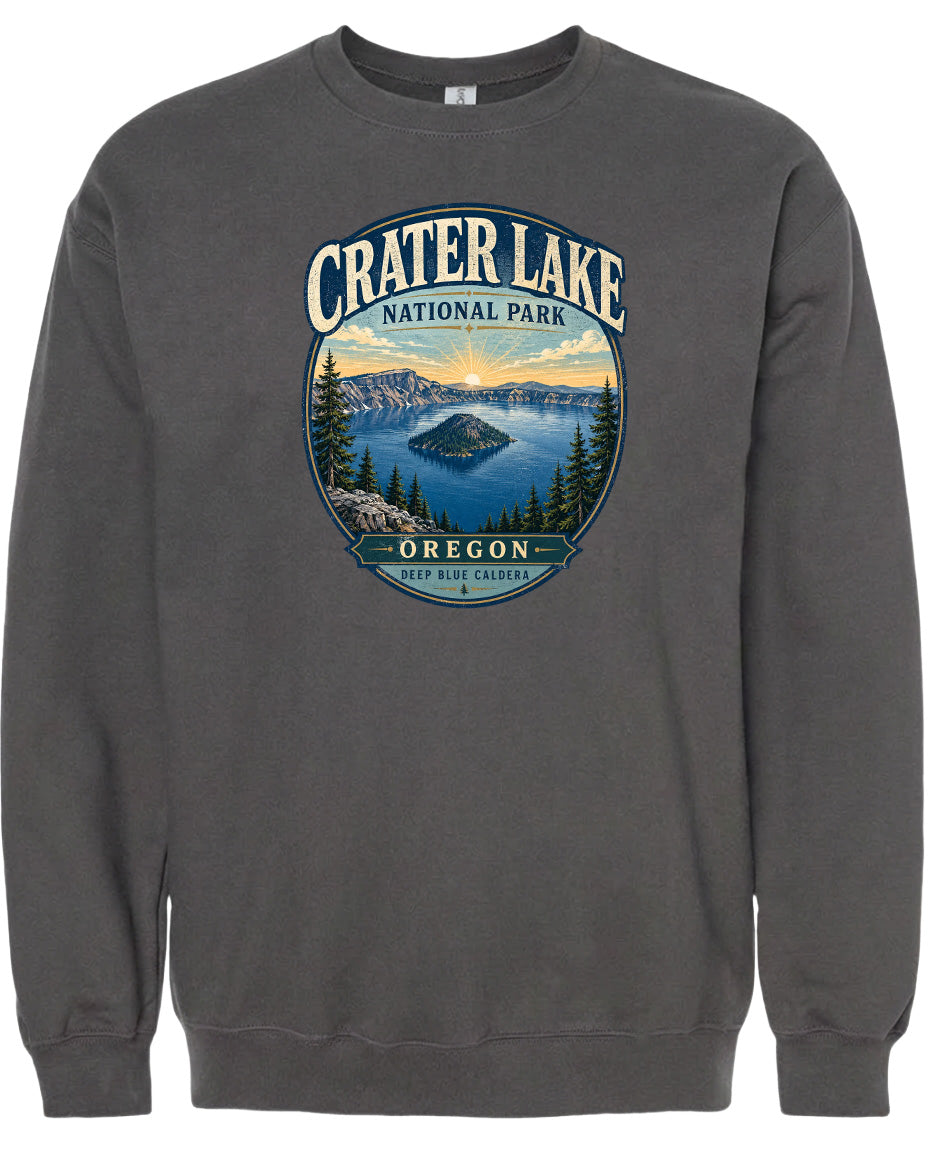 A gray sweatshirt with a graphic design depicting Crater Lake National Park in Oregon.