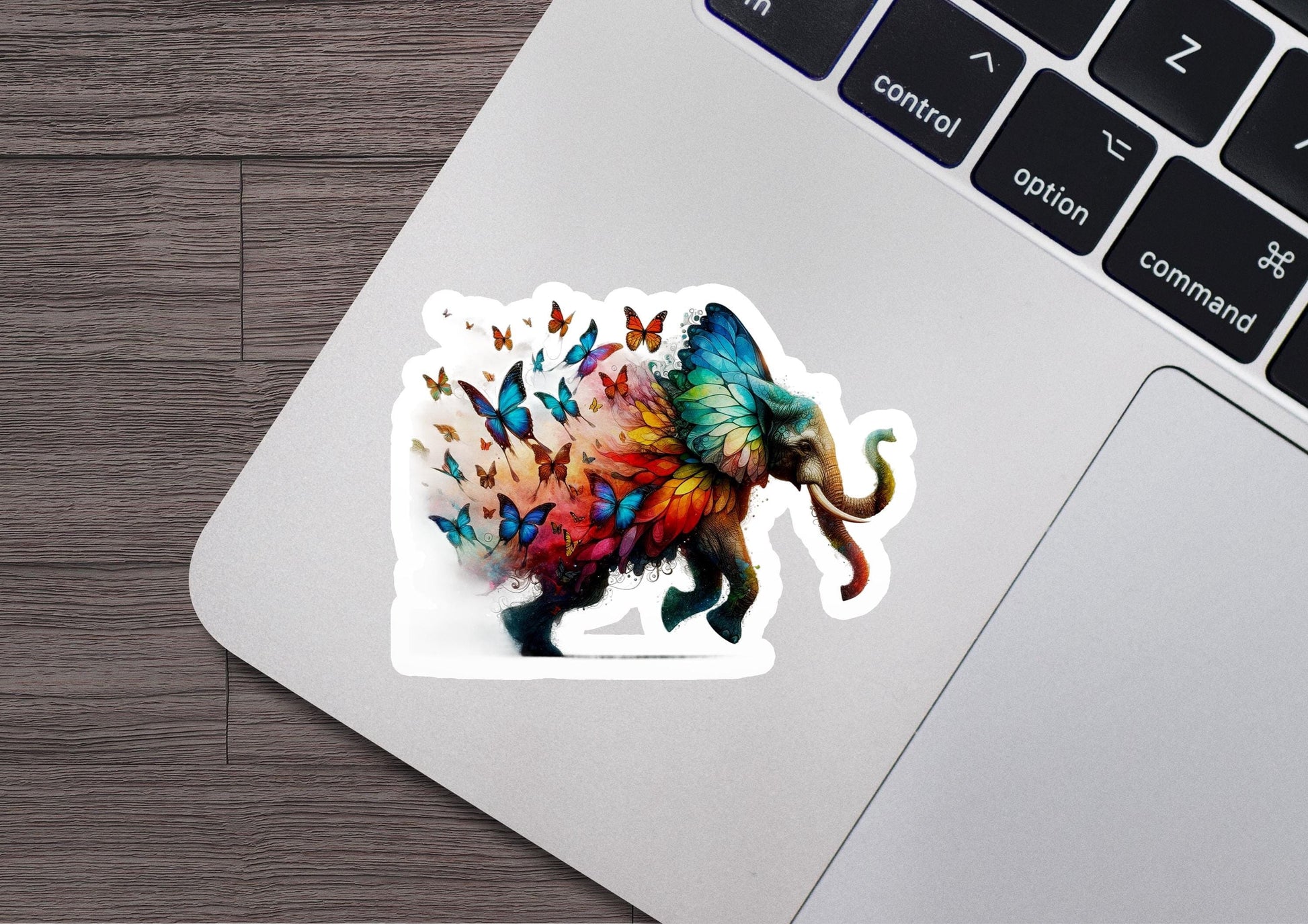 a sticker of an elephant with butterflies on it