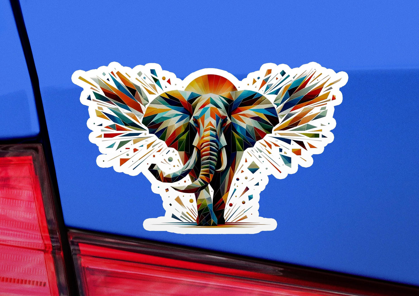 an elephant sticker on the back of a car