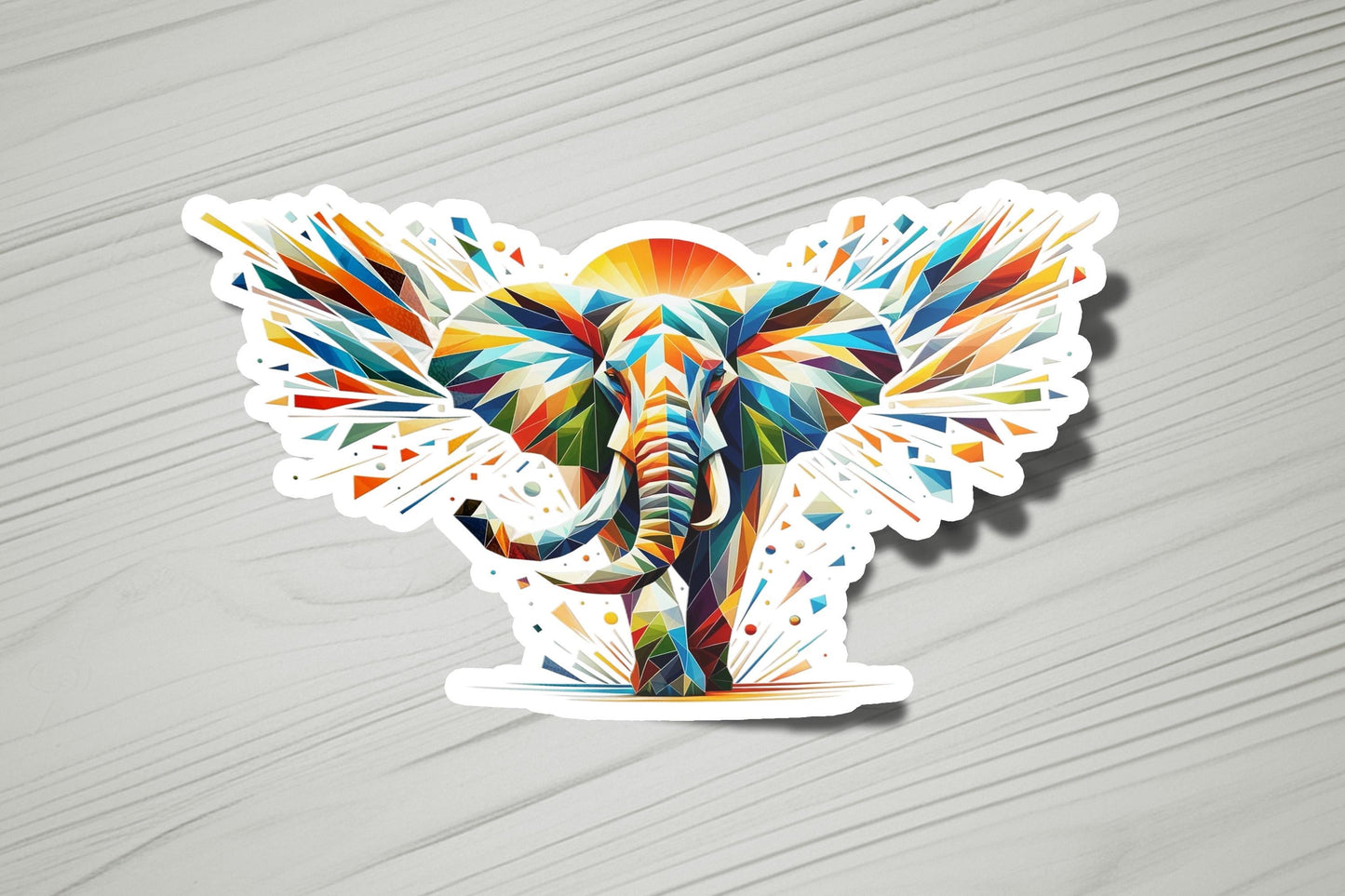 a sticker of an elephant with colorful paint splatters