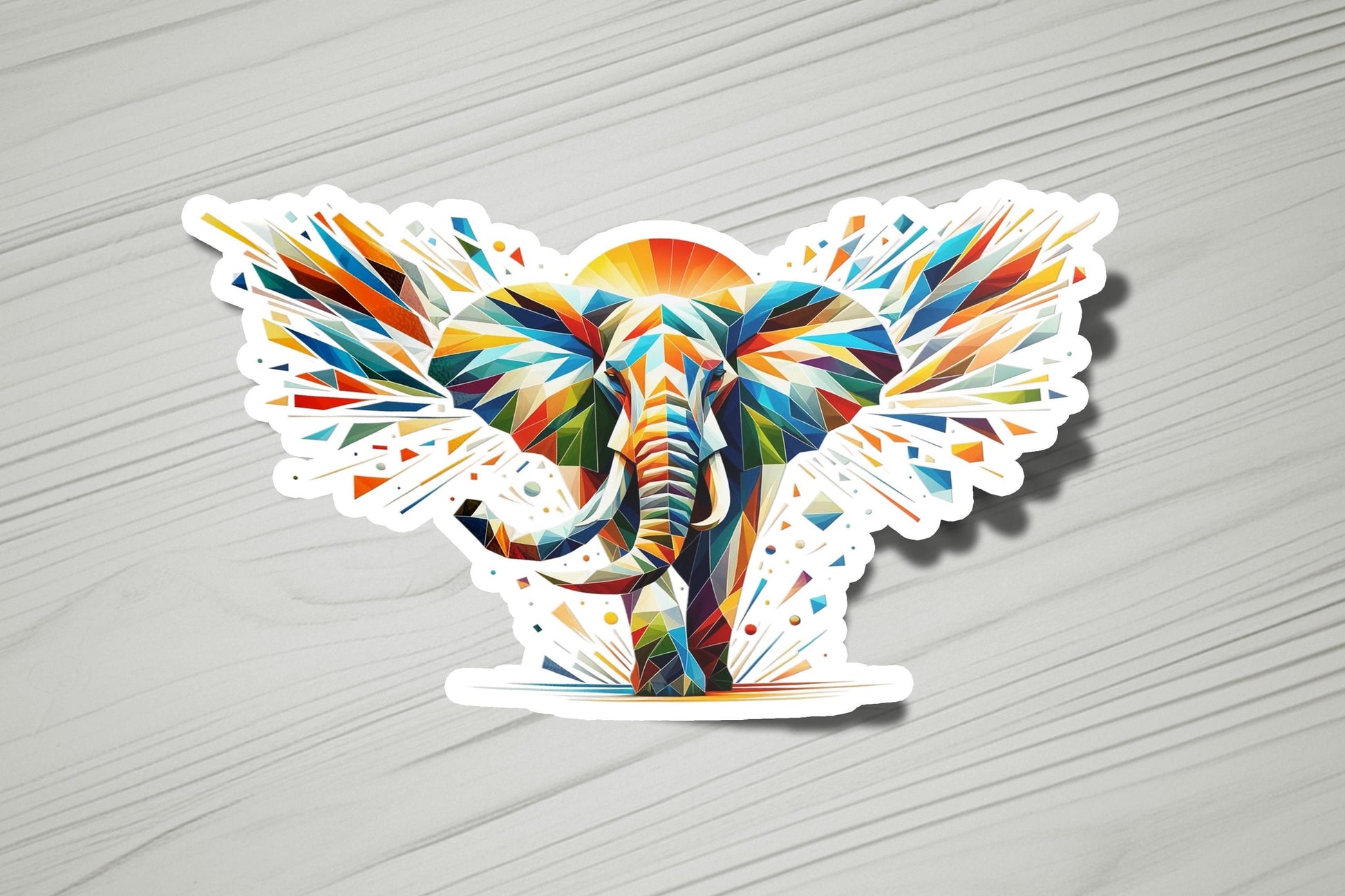 a sticker of an elephant with colorful paint splatters