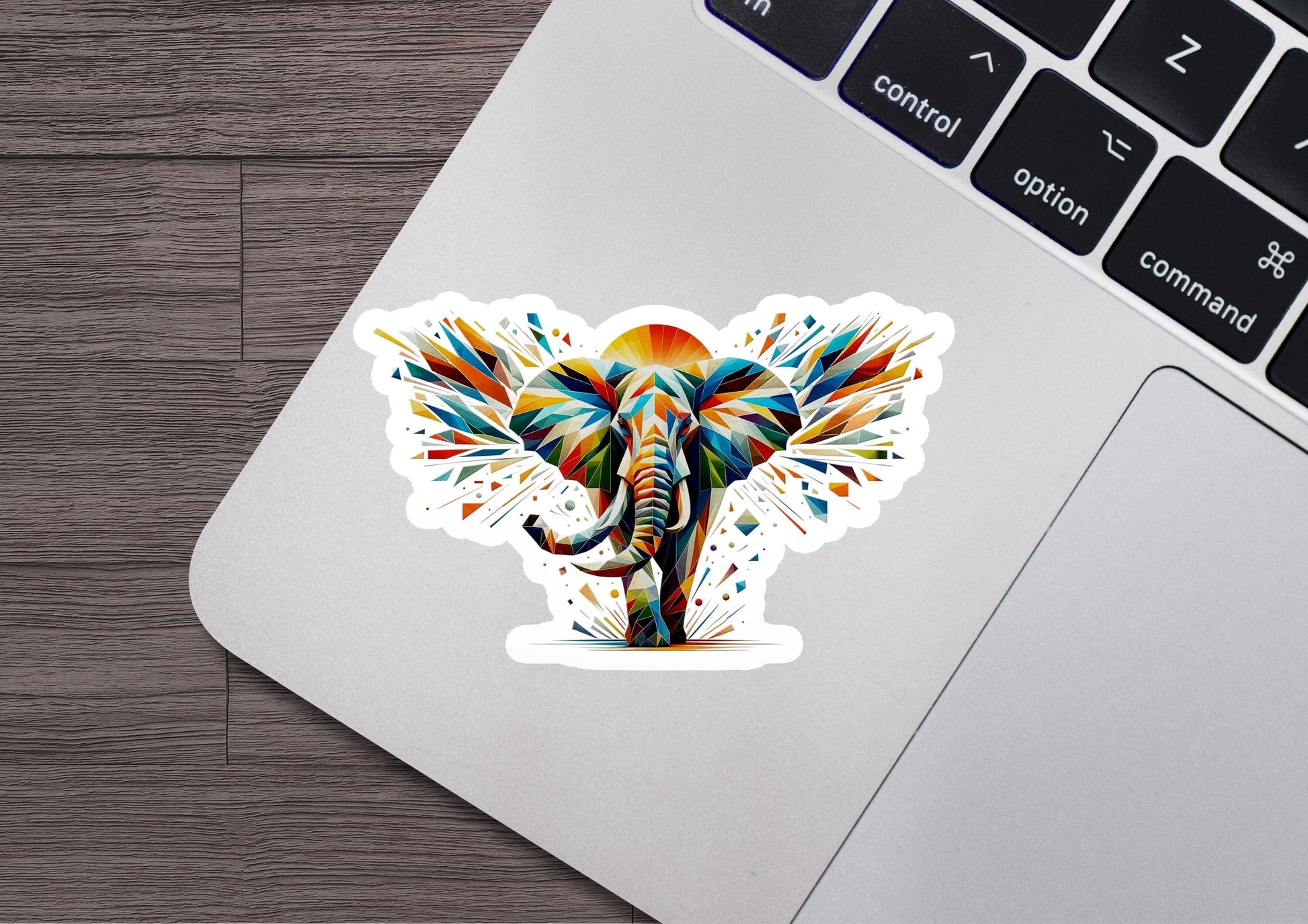 an elephant sticker on a laptop keyboard