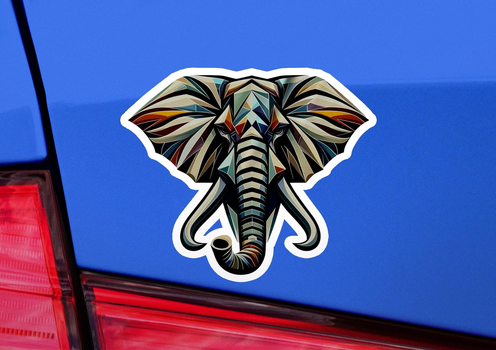 an elephant sticker on the back of a car
