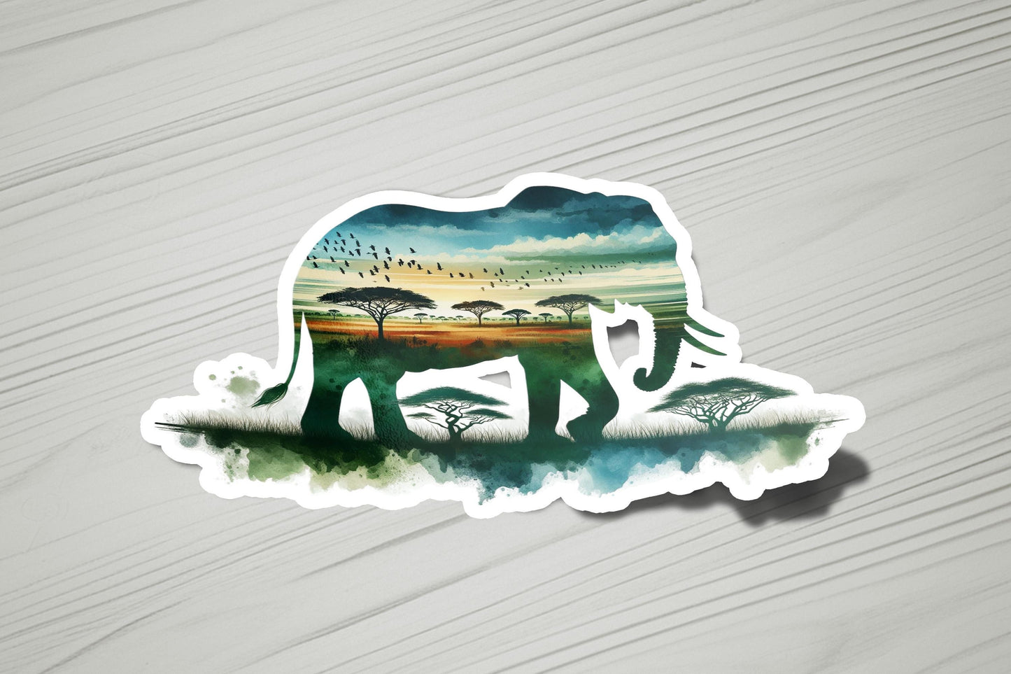 a sticker of an elephant with trees in the background