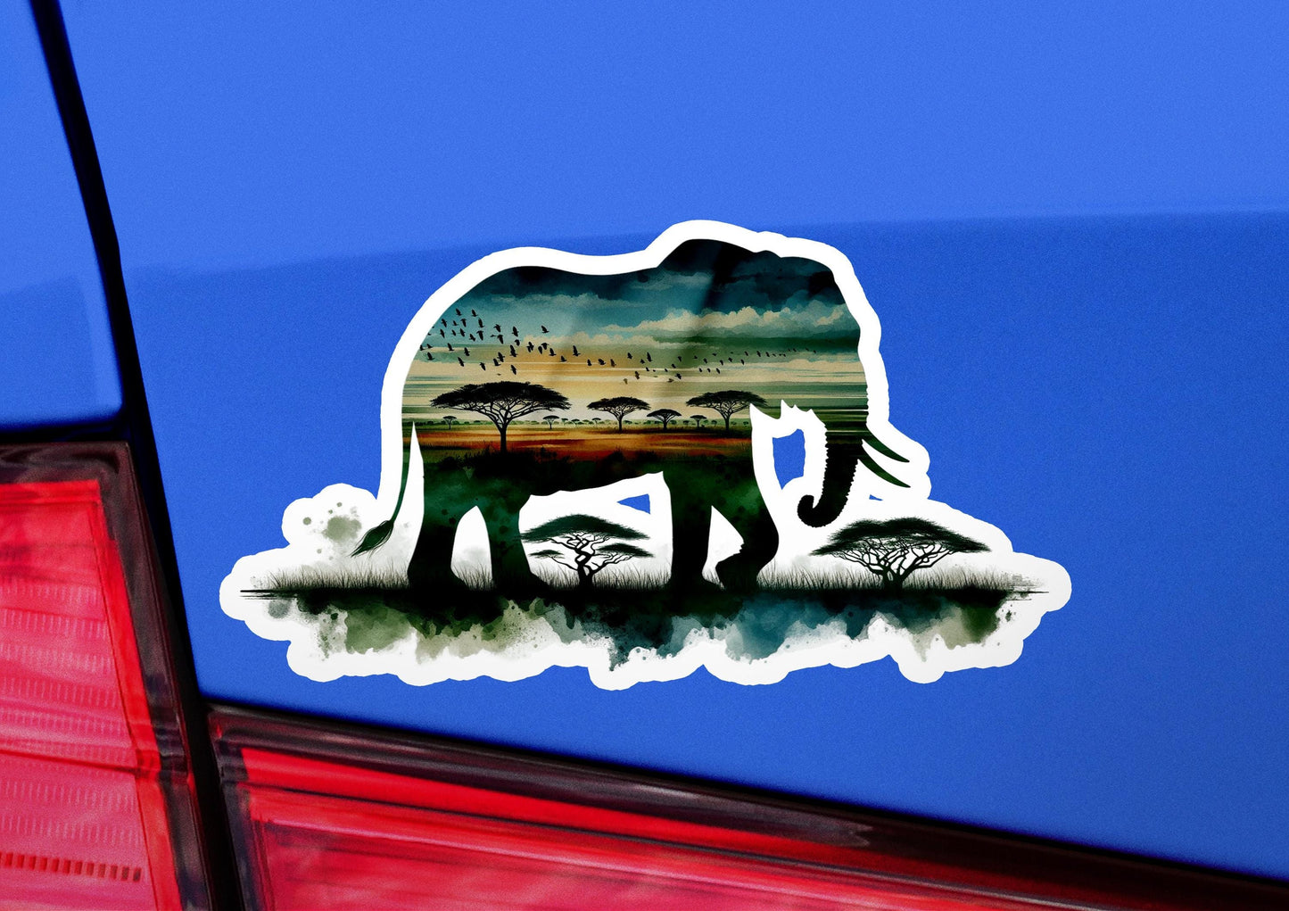 an elephant sticker on the back of a car