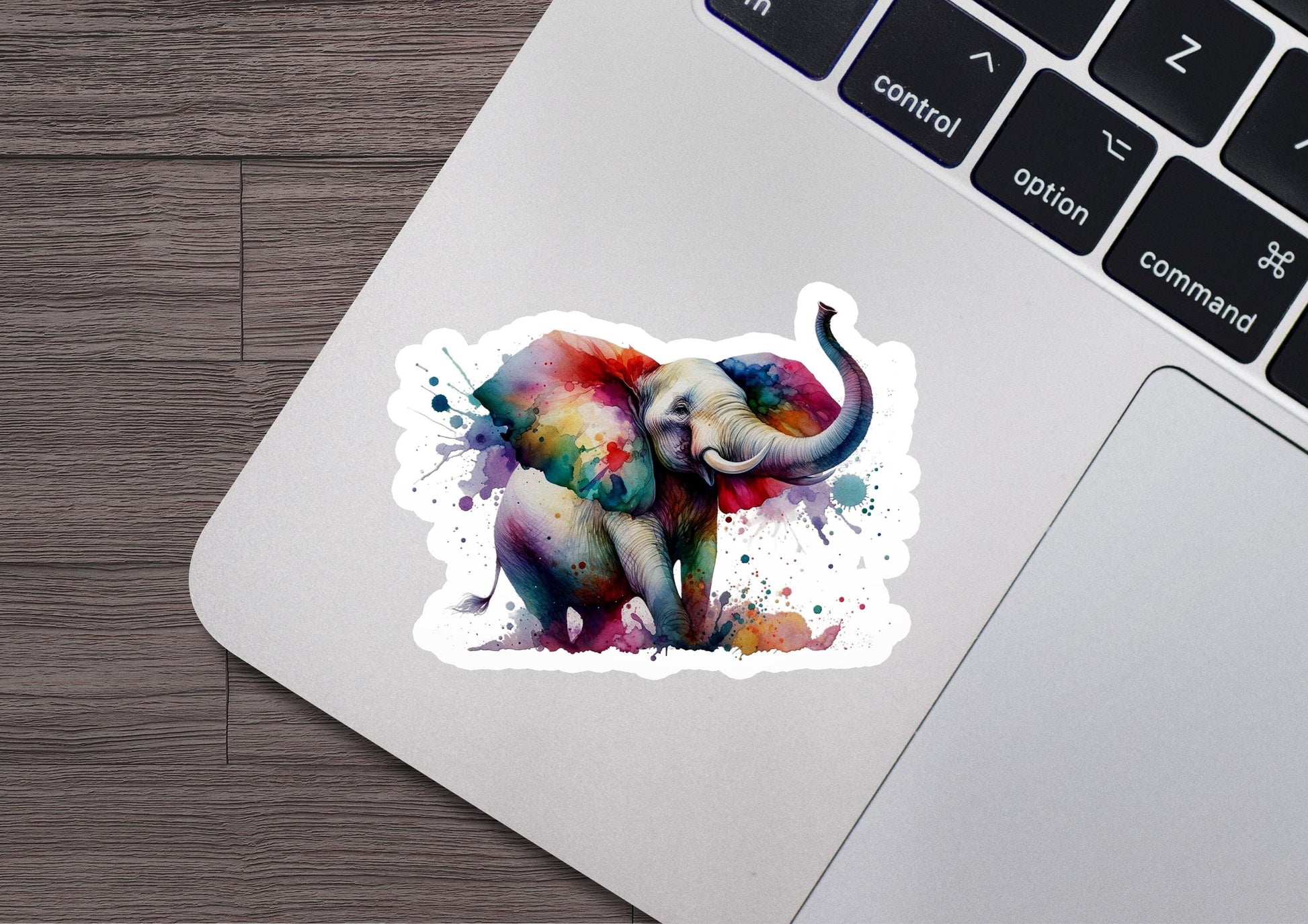 an elephant sticker on a laptop keyboard