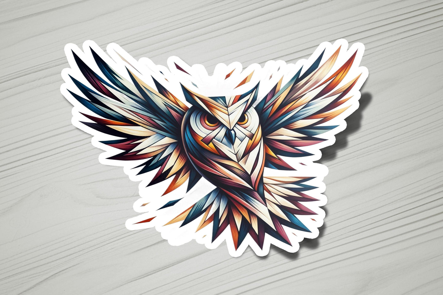 a sticker of an owl with colorful wings
