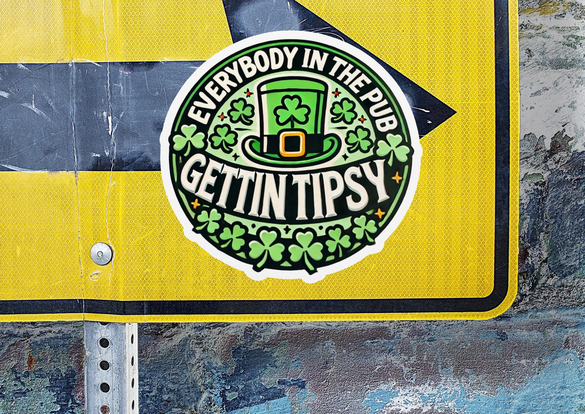 a yellow and black street sign with a green hat on it