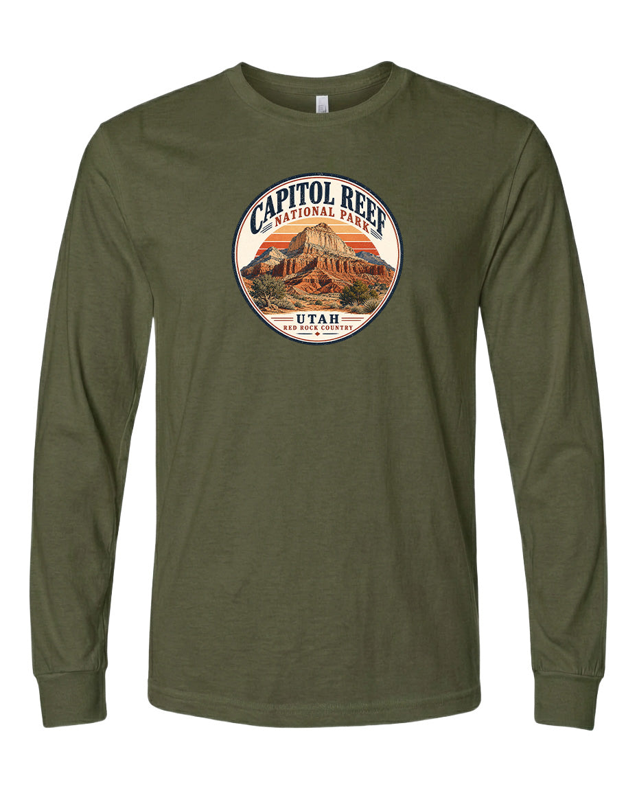 A long-sleeved olive green t-shirt with a circular graphic design featuring the Capitol Reef National Park in Utah.