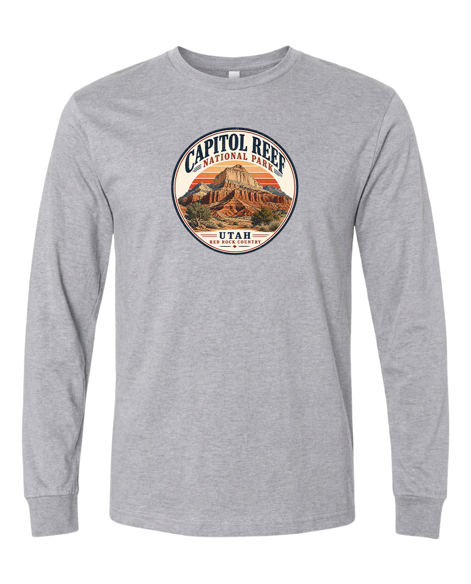 A gray long-sleeved t-shirt with a circular graphic design featuring the Capitol Reef National Park in Utah.