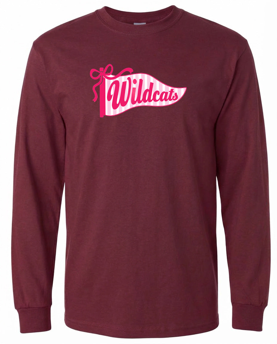 A burgundy long-sleeved t-shirt with a graphic design featuring the text "Wildcats" in pink and white colors.