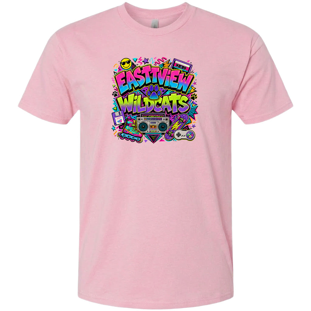 A pink t-shirt with a colorful graphic design featuring a boombox, sunglasses, and various other elements, along with the text "Eastview Wildcats".