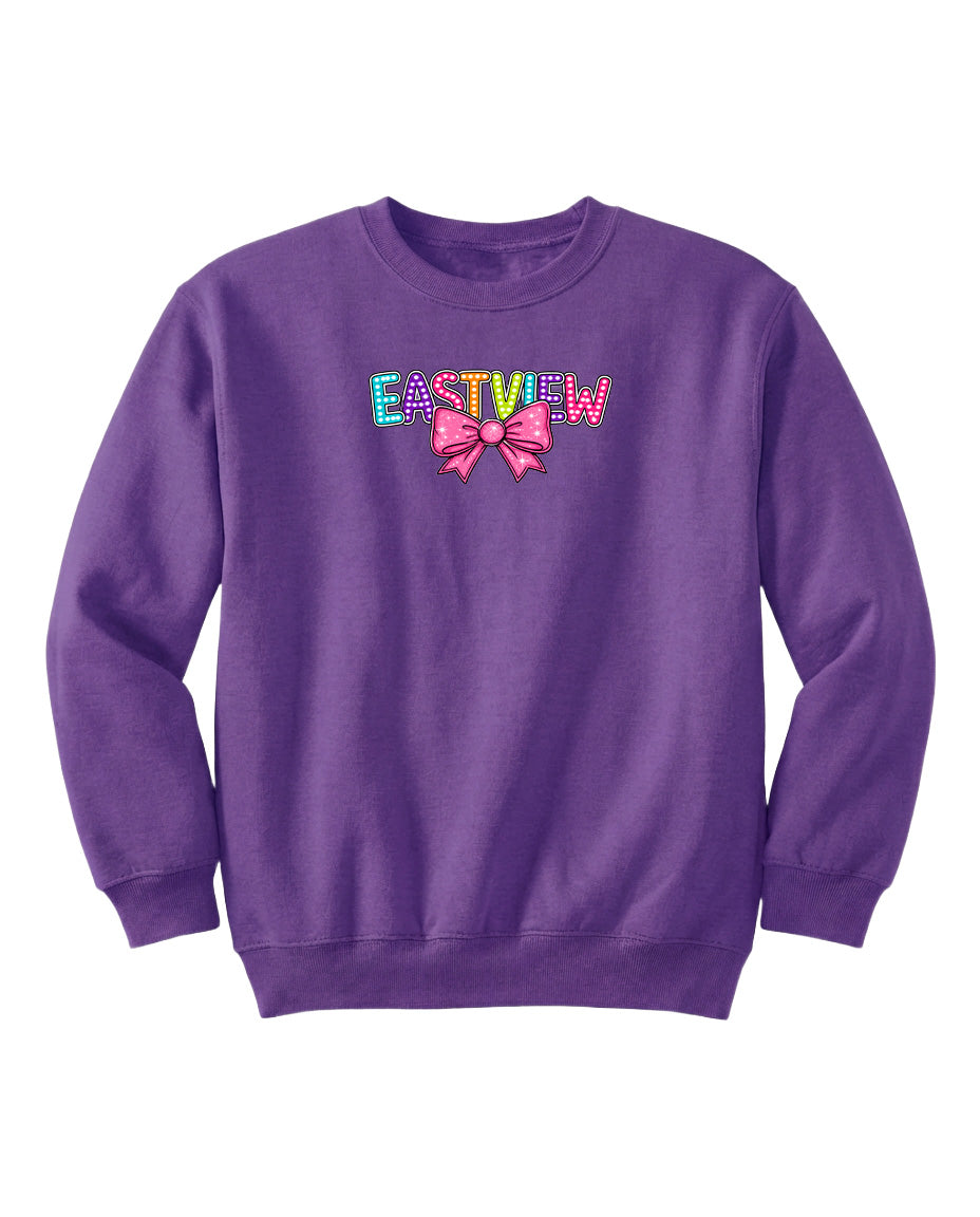 A purple sweatshirt with the word "EASTVIEW" printed on it, along with a bow design.