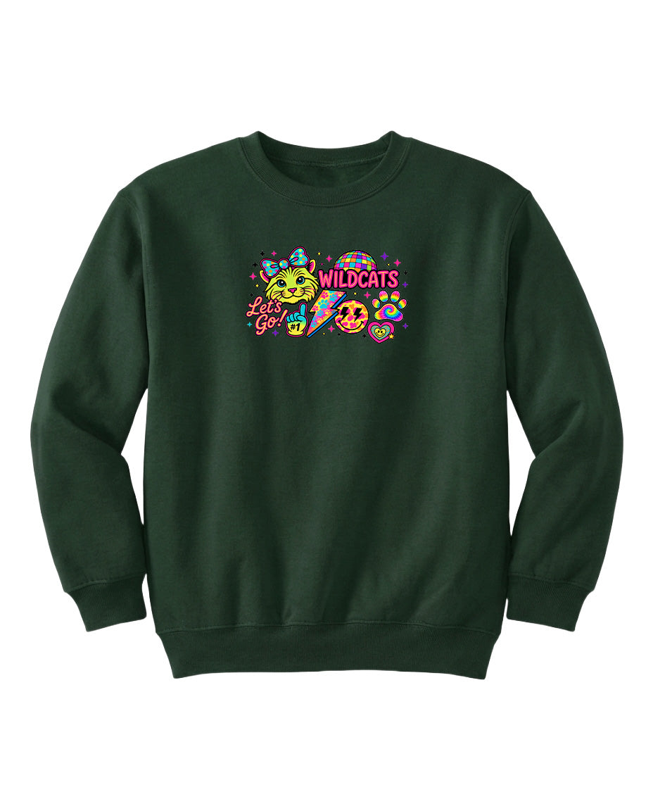 A dark green sweatshirt with a colorful graphic design featuring a smiling face, a rainbow, and the text "WILDCATS" prominently displayed.