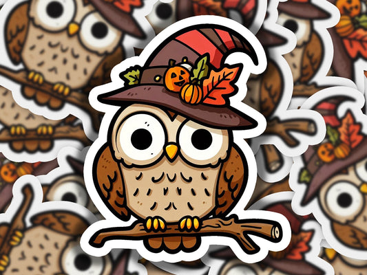 a sticker of an owl wearing a hat and holding a branch
