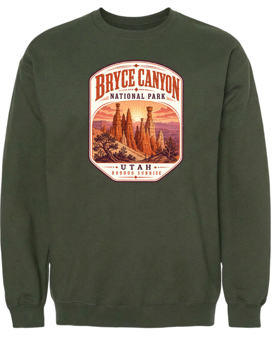 A green sweatshirt with a graphic design depicting the Bryce Canyon National Park in Utah.