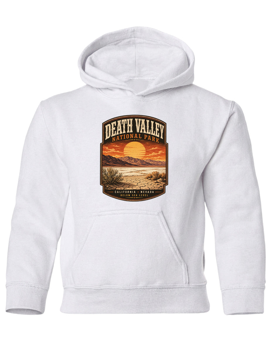 A white hoodie with a graphic design depicting a scenic landscape with mountains, a sunset, and a river.