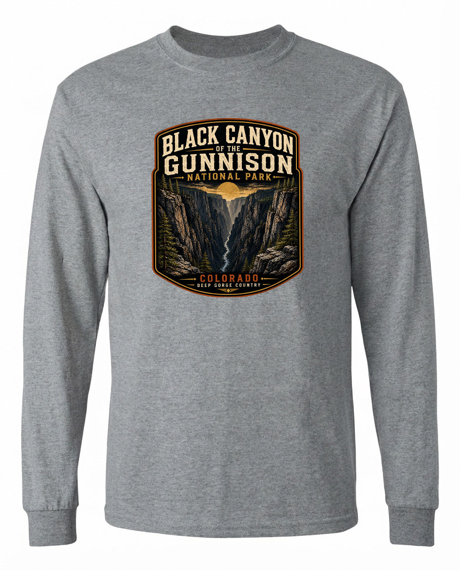 A gray long-sleeved t-shirt with a graphic design depicting the Black Canyon of the Gunnison National Park in Colorado.