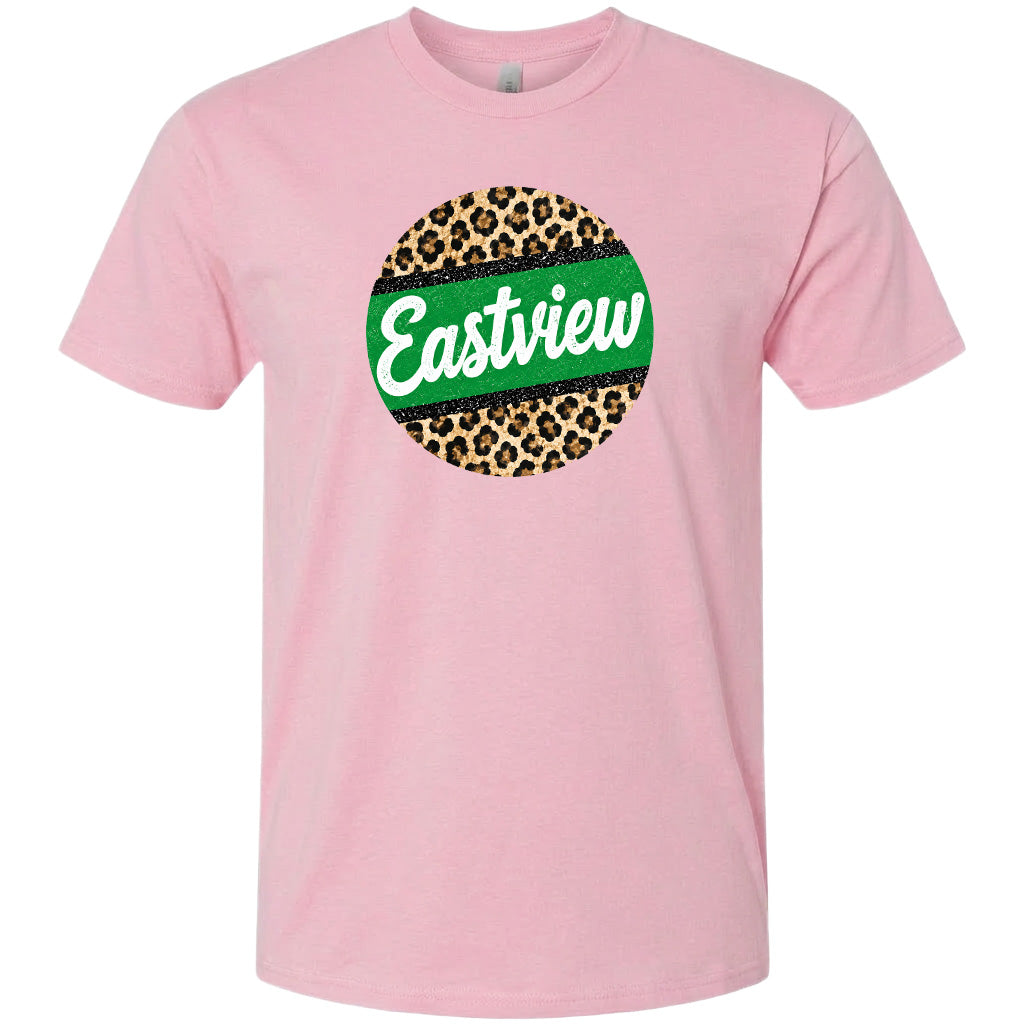 A pink t-shirt with a circular graphic design featuring a leopard print pattern and the word "Eastview" written in white cursive font.