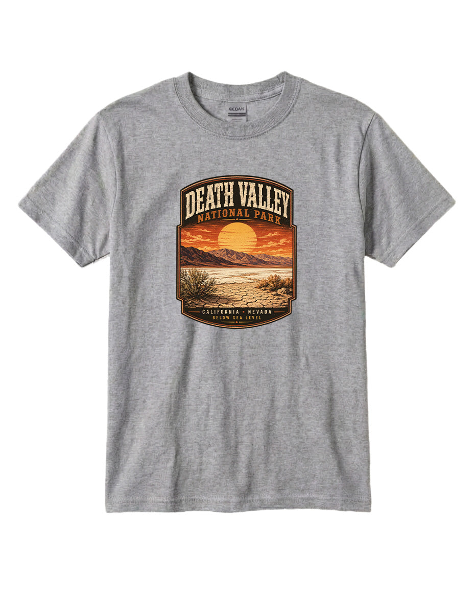 A gray t-shirt with a graphic design depicting a sunset over Death Valley National Park, California, Nevada.