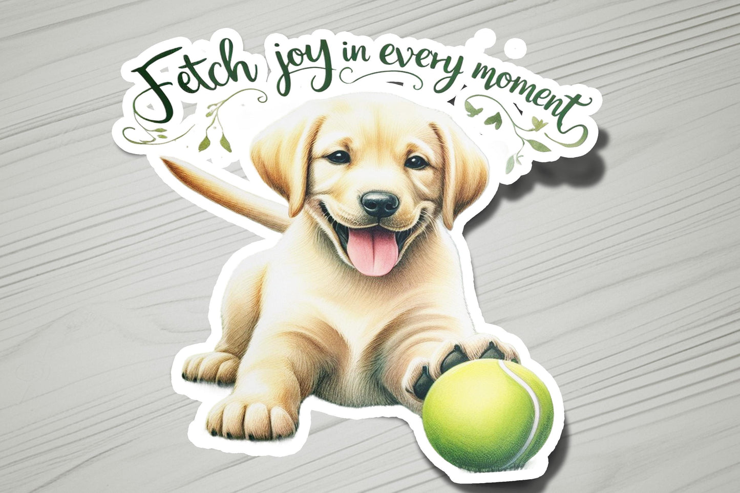 a sticker of a dog holding a tennis ball