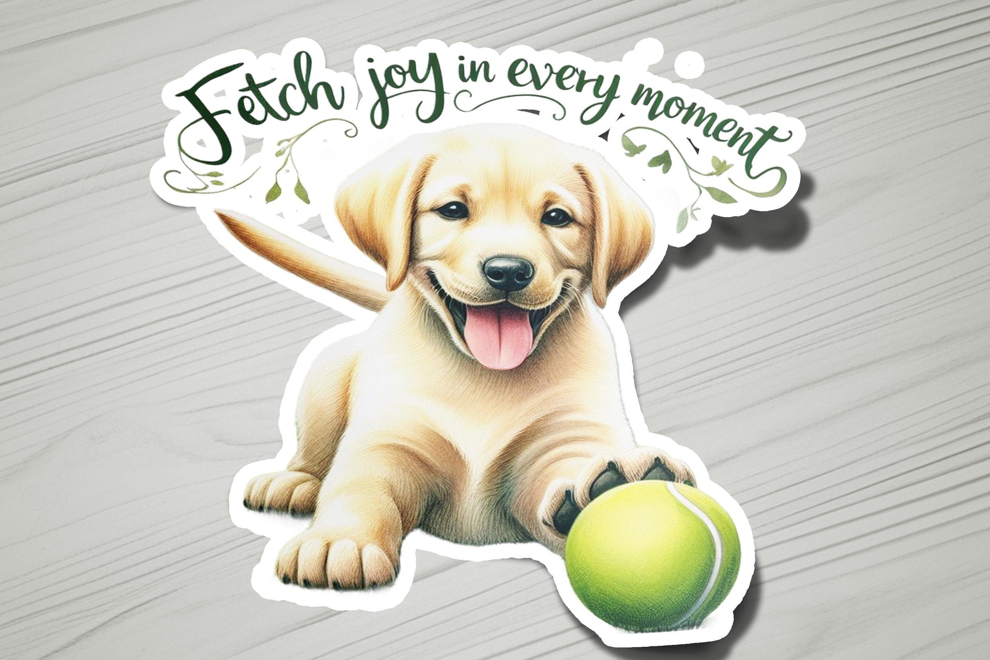 a sticker of a dog holding a tennis ball