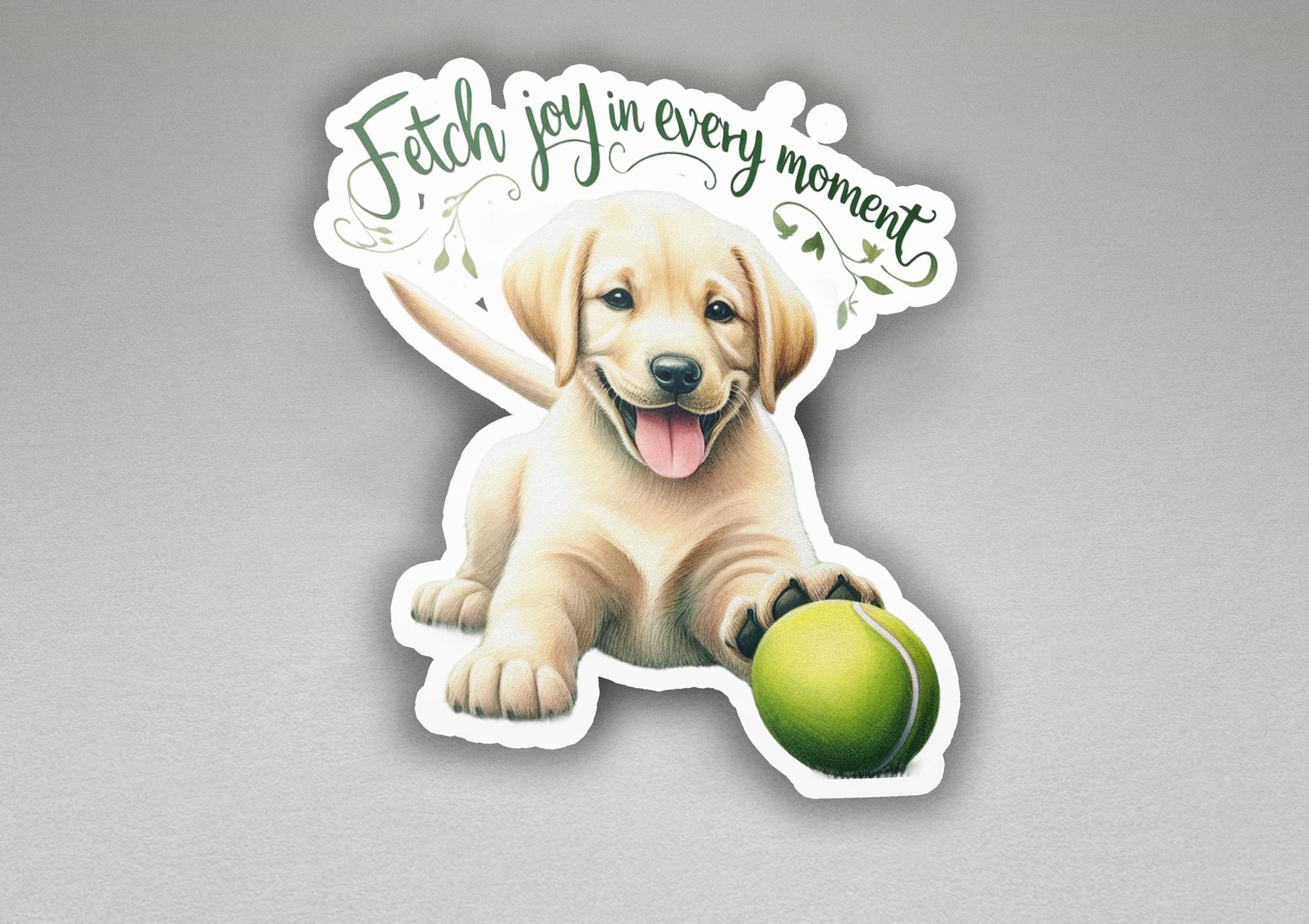 a sticker of a dog holding a tennis ball