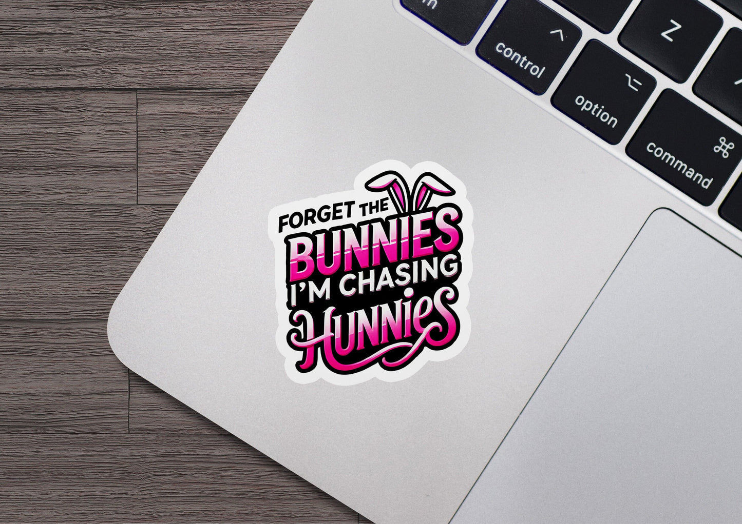 a laptop with a sticker that says forget the bunnies i'm chasing