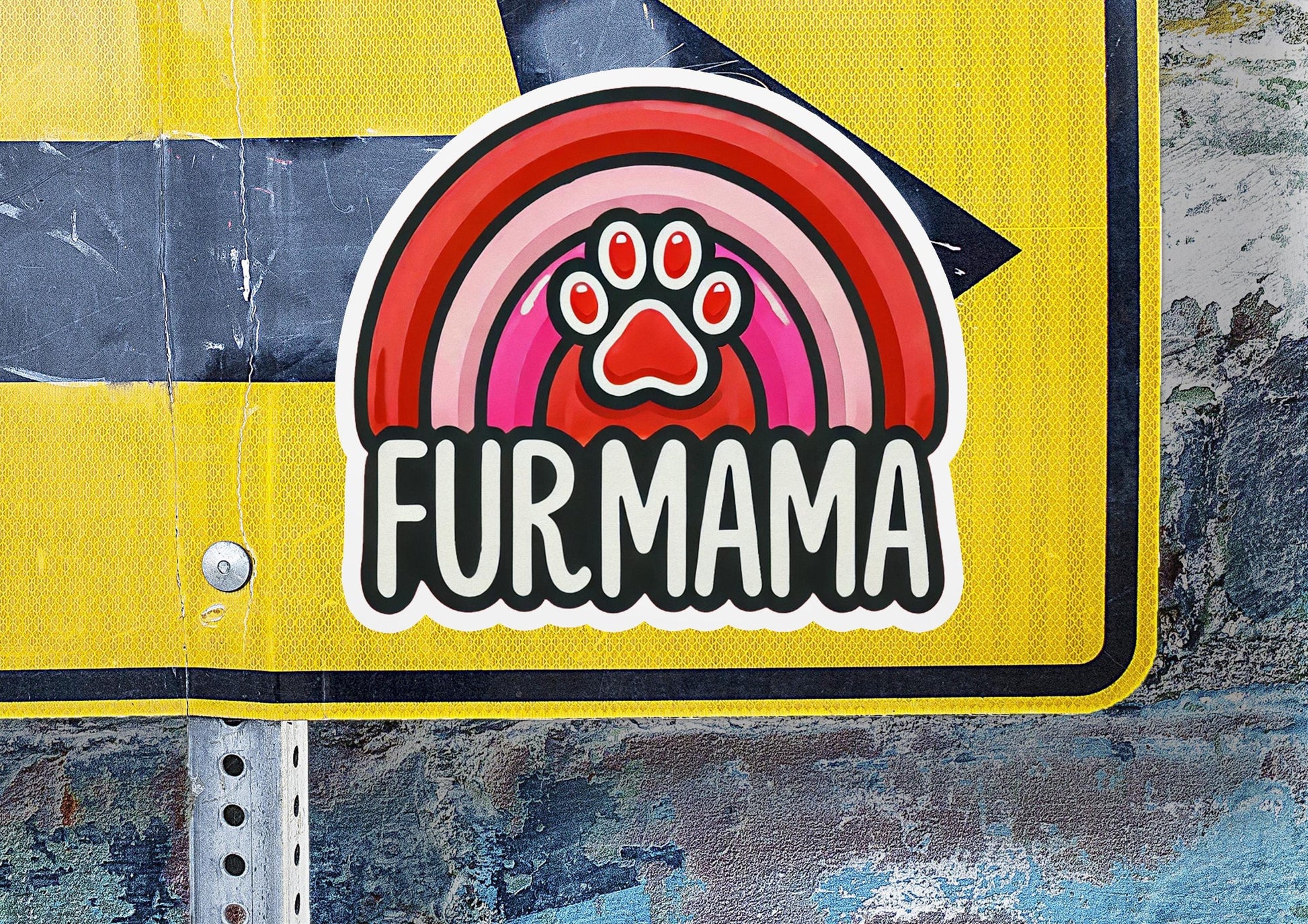 a close up of a street sign with a dog paw