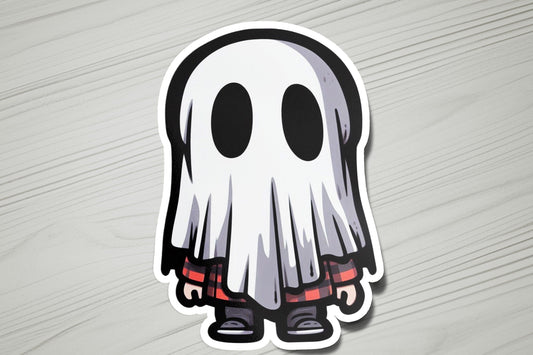 a sticker of a ghost on a wooden surface