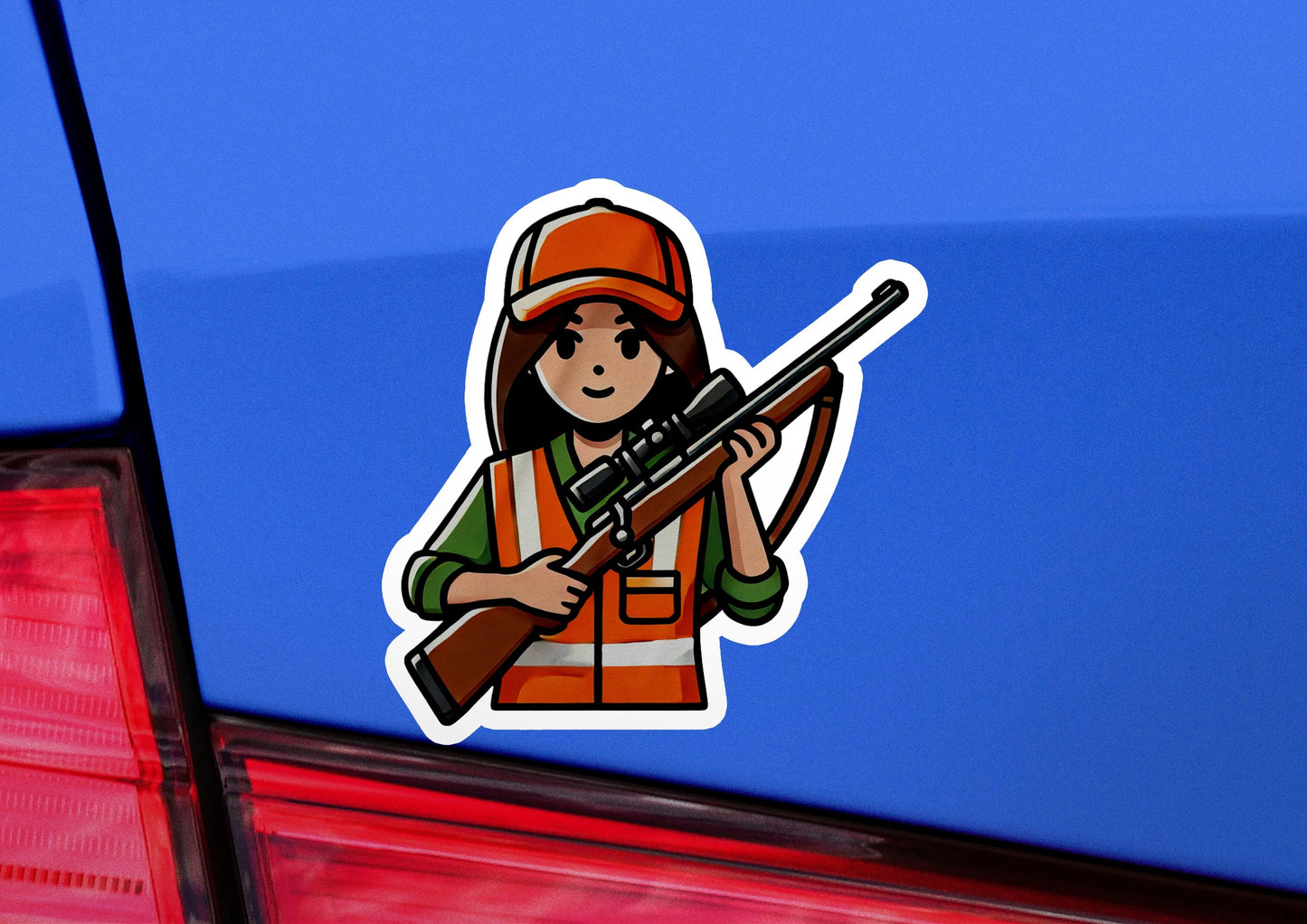 a sticker of a woman holding a rifle