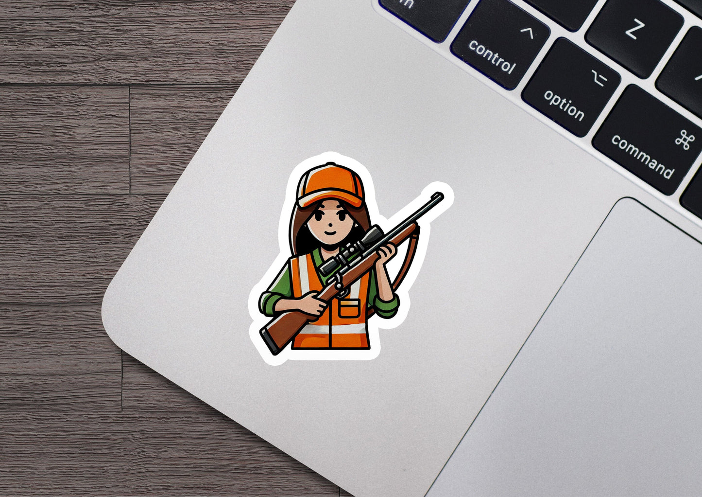 a sticker of a woman holding a rifle