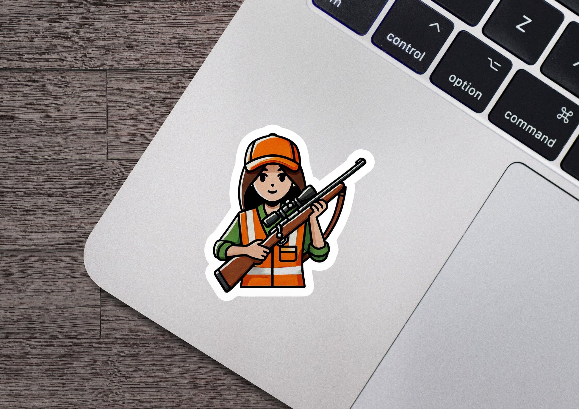 a sticker of a woman holding a rifle