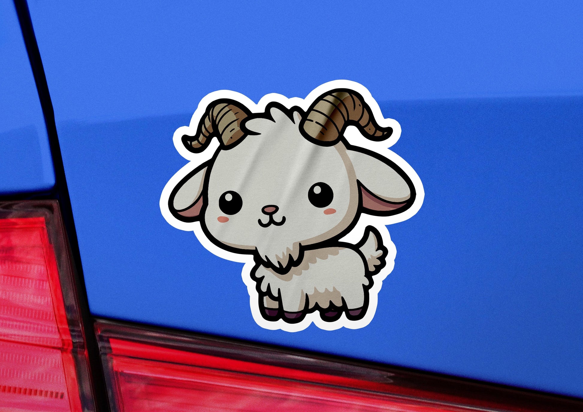 a sticker of a ram on the back of a car