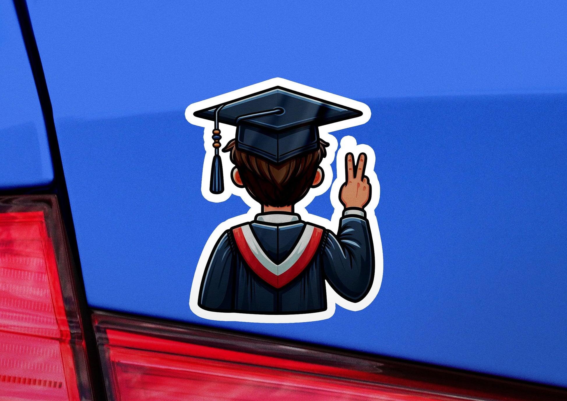 a sticker of a graduate giving the peace sign
