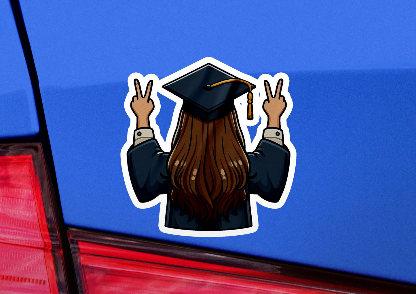 a car with a sticker of a graduate holding a peace sign