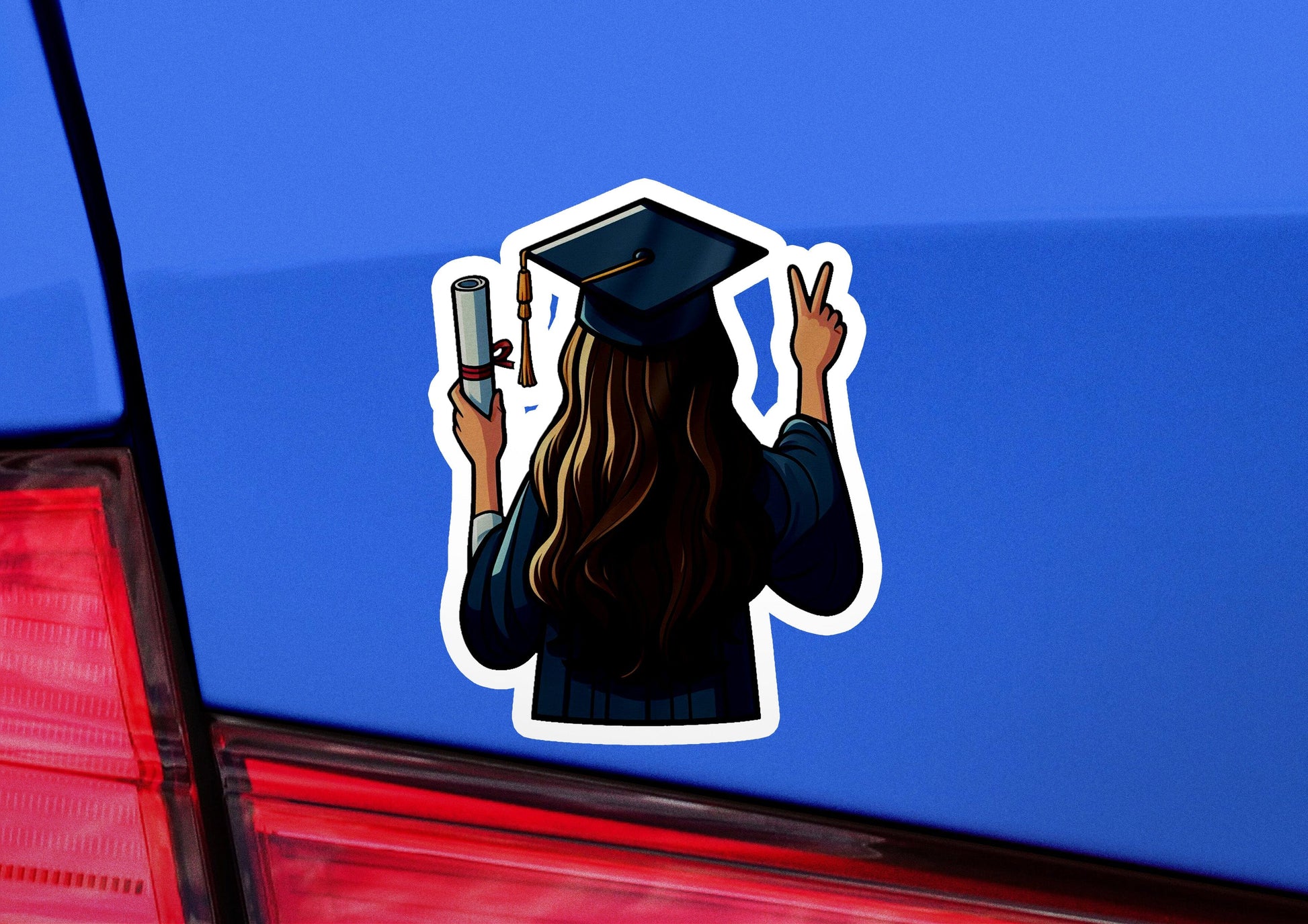 a sticker of a graduate holding a cell phone