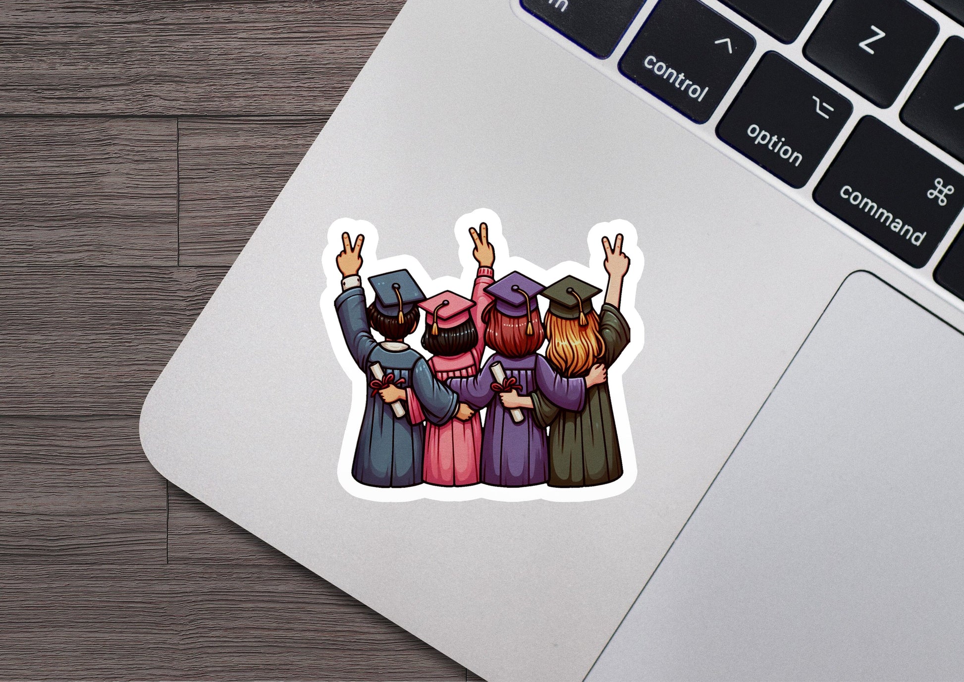 a laptop with a sticker of a group of people on it
