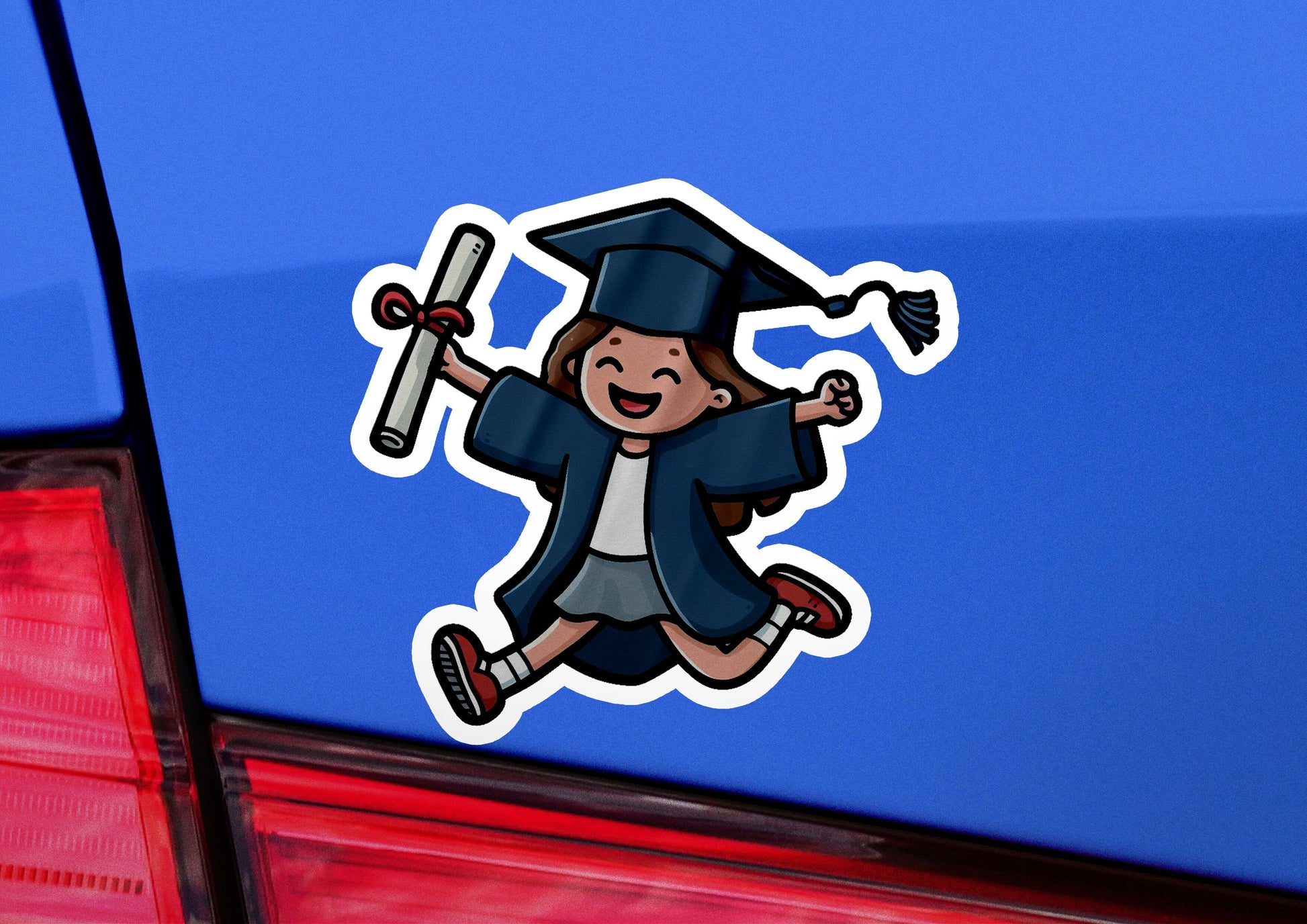 a sticker of a girl in a graduation cap and gown