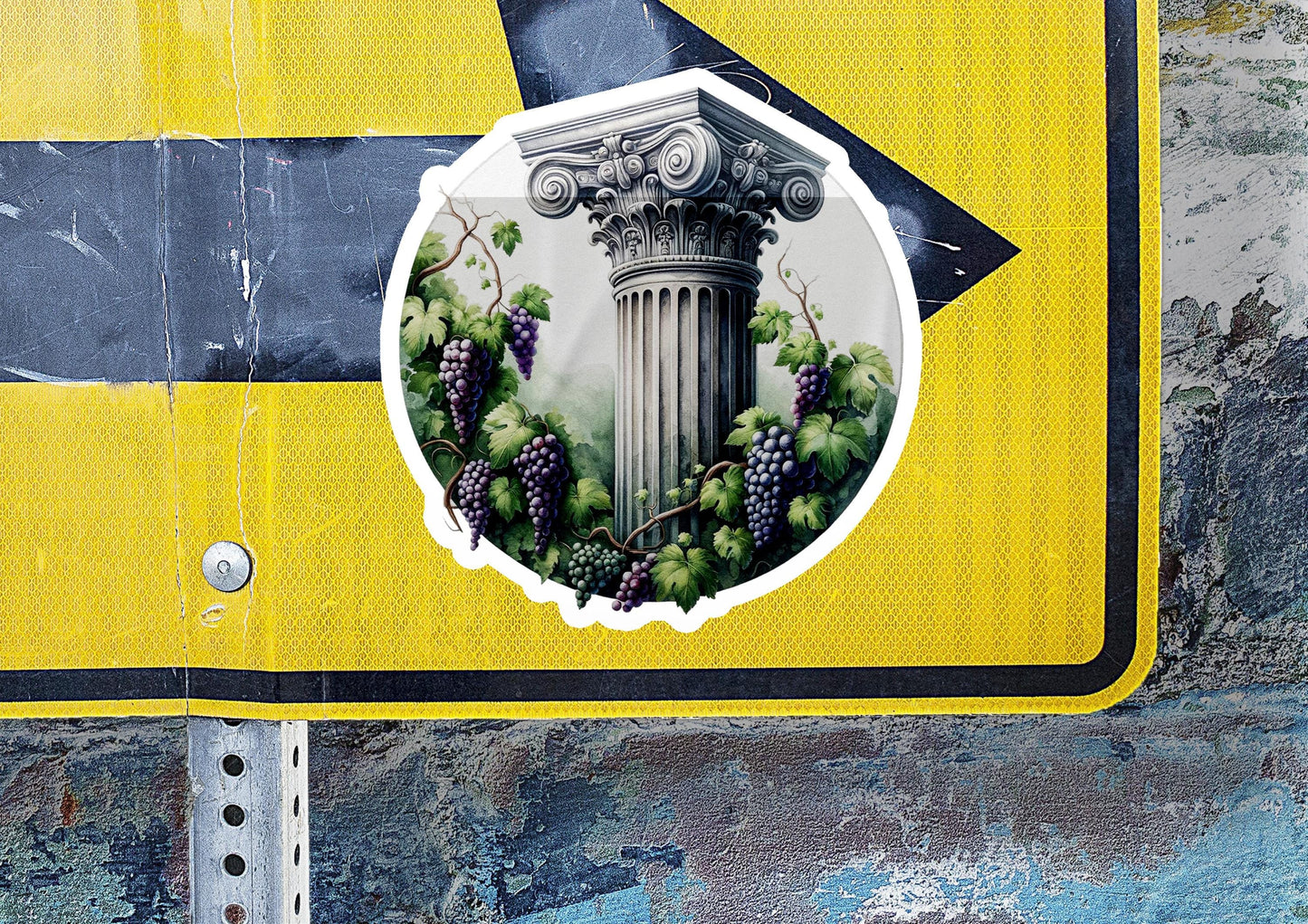 a street sign with a picture of a column and grapes on it