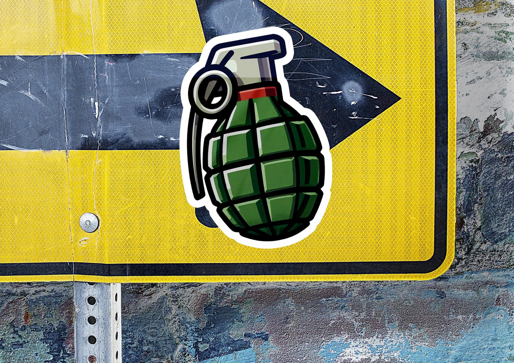 a sticker of a bomb can on a street sign