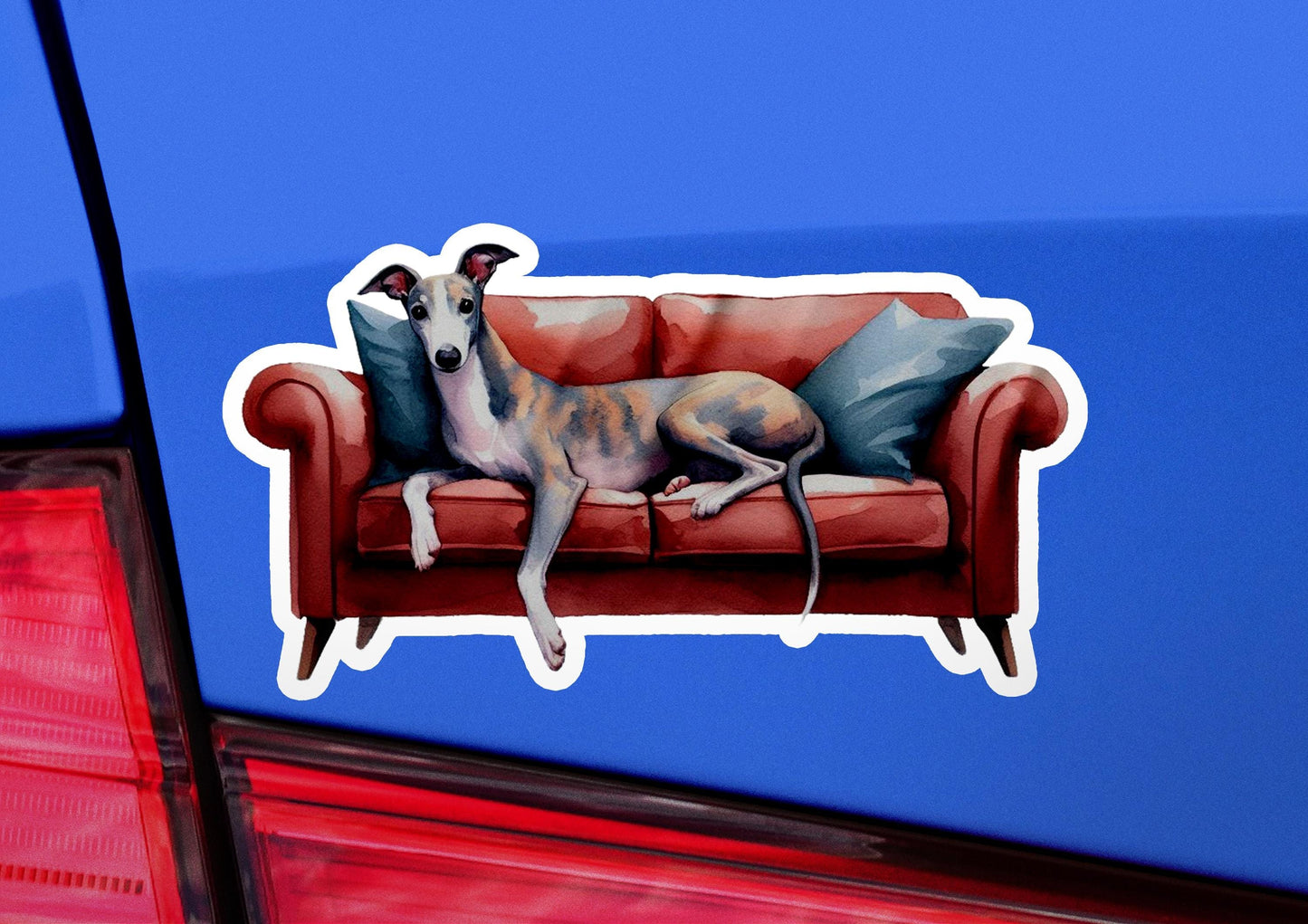 a sticker of a dog laying on a couch