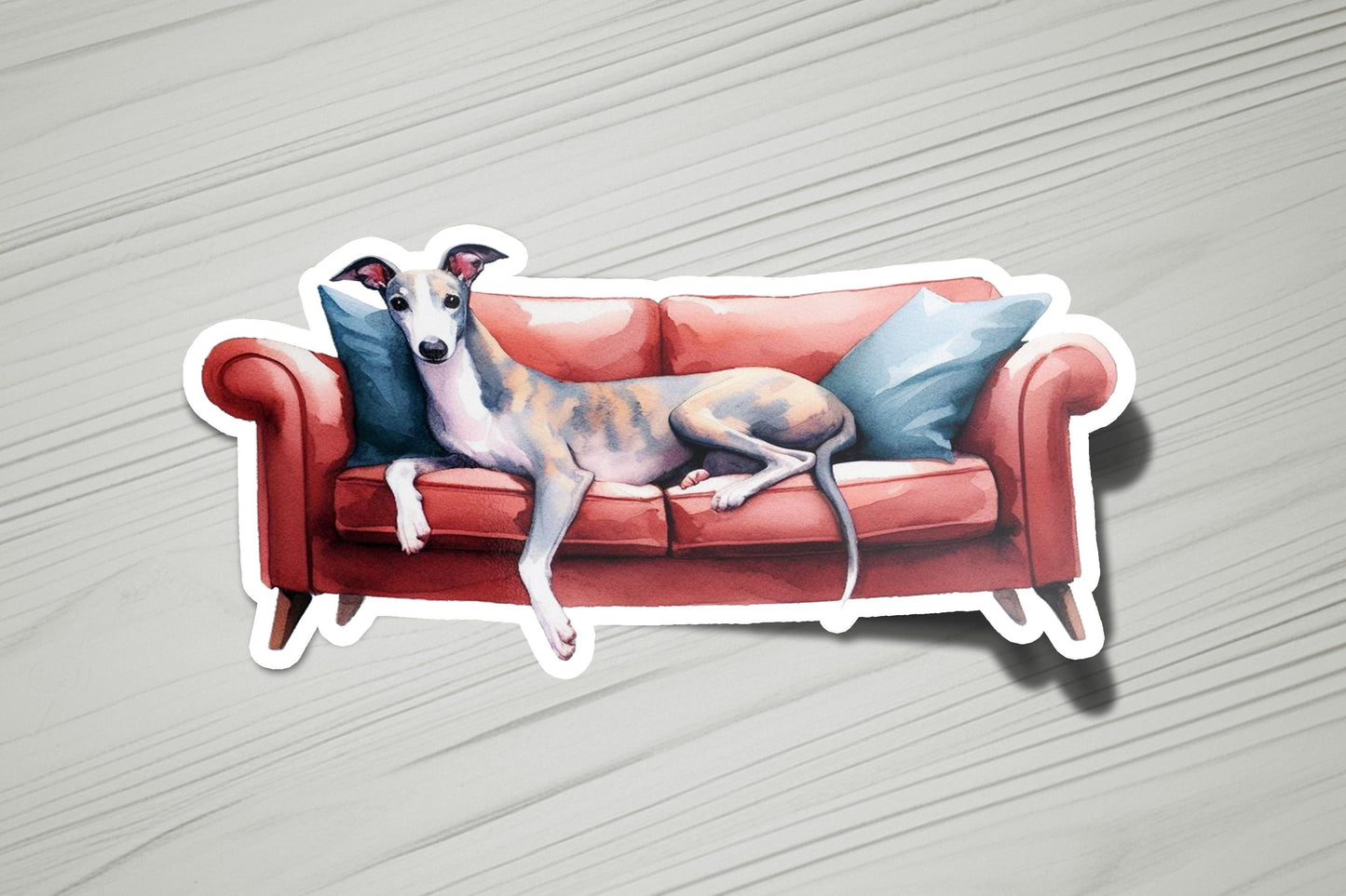 a sticker of a dog laying on a couch