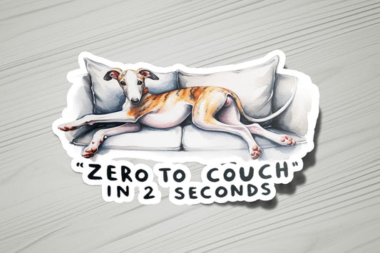 a sticker of a dog sleeping on a couch