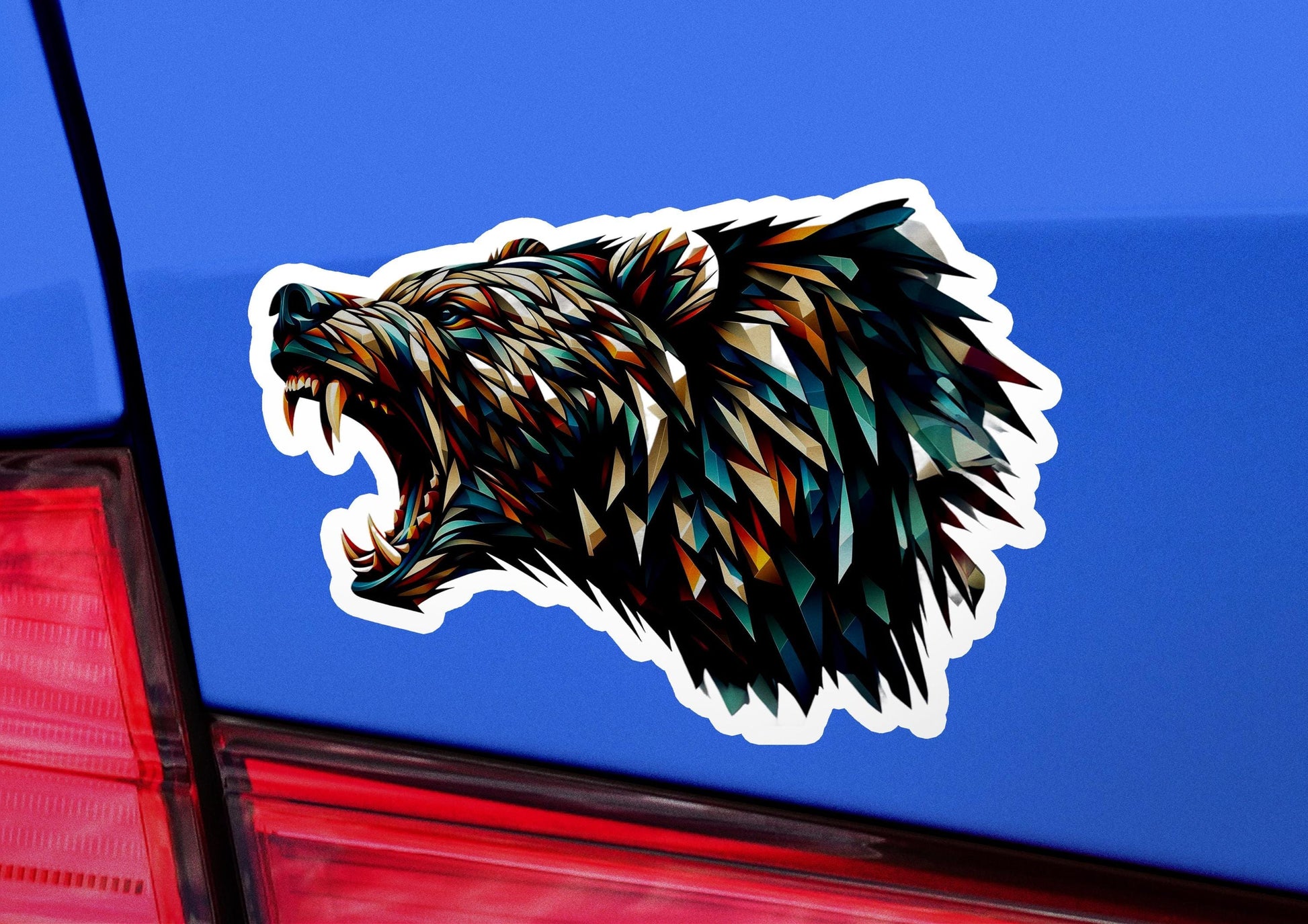 a bear sticker on the back of a car