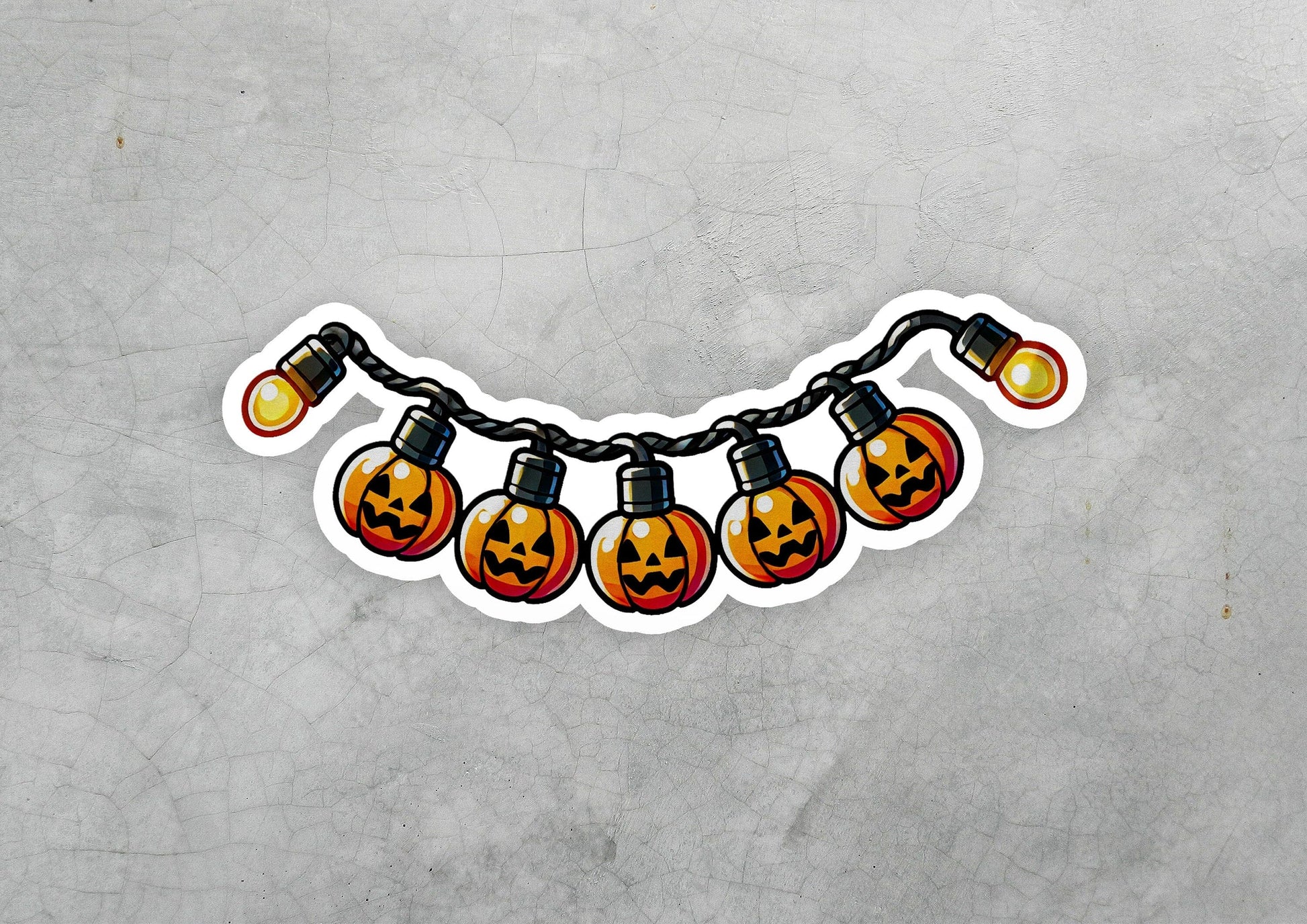 a sticker of a string of halloween lights with jack - o&#39;- lanterns